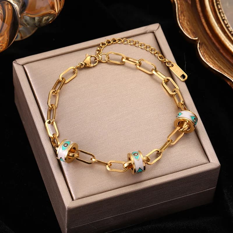 Guldfarvet flerlags charme-armbånd