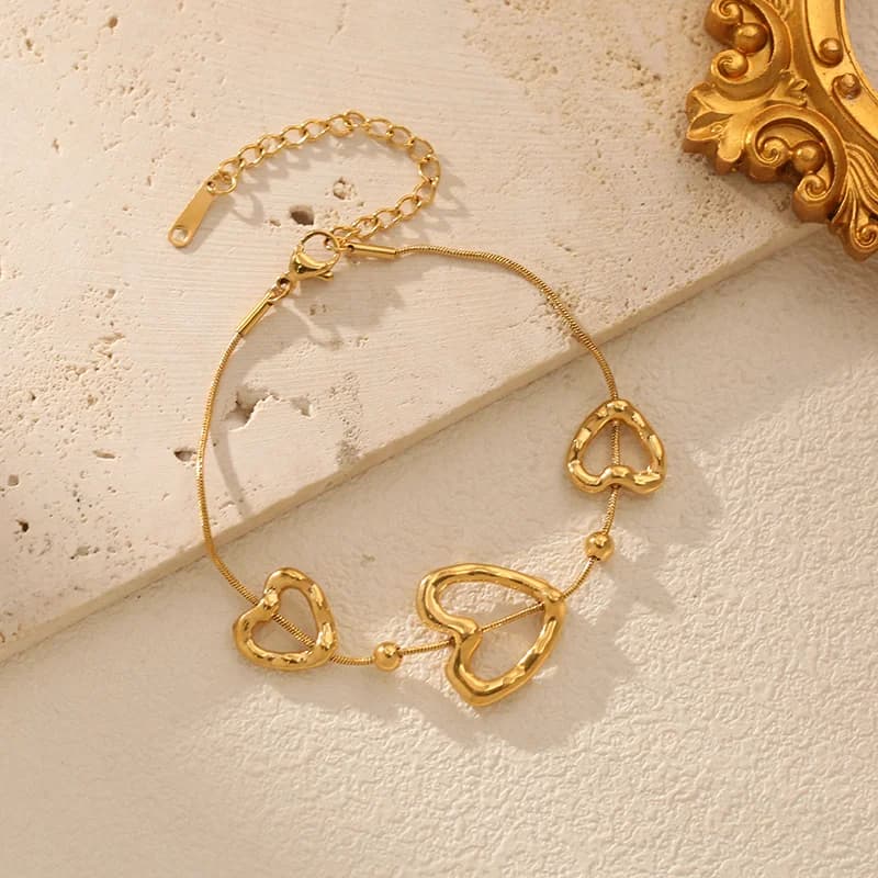 Udhulet hjerteformet kæde armbånd, guldfarvet rustfrit stål
