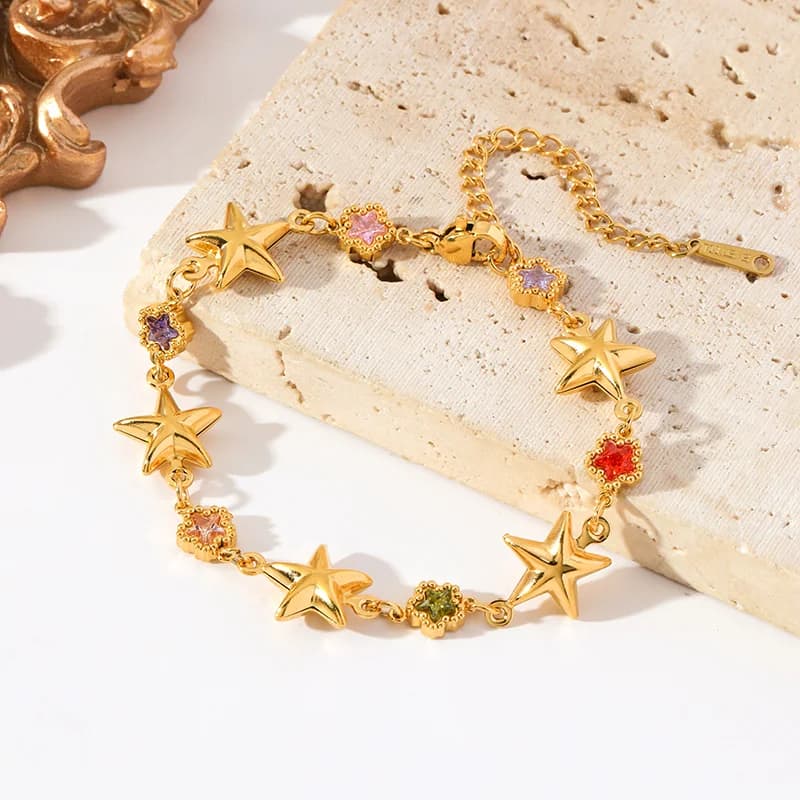 Armbånd med farverige stjerner og zirkoner, guld
