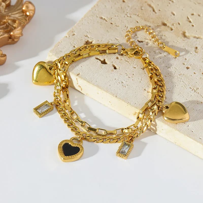 Vendbart hjertevedhæng armbånd, forgylt