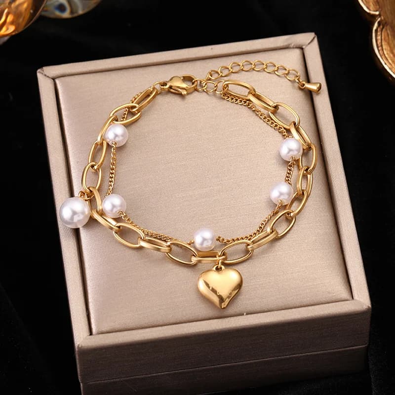 Guldfarvet flerlags charme-armbånd